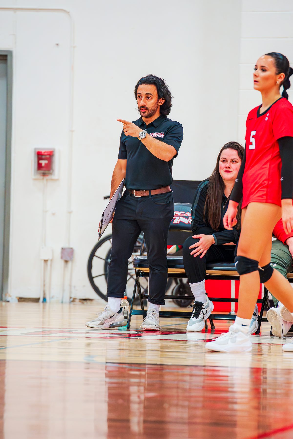 Coach Saba directing during a Seneca Sting match